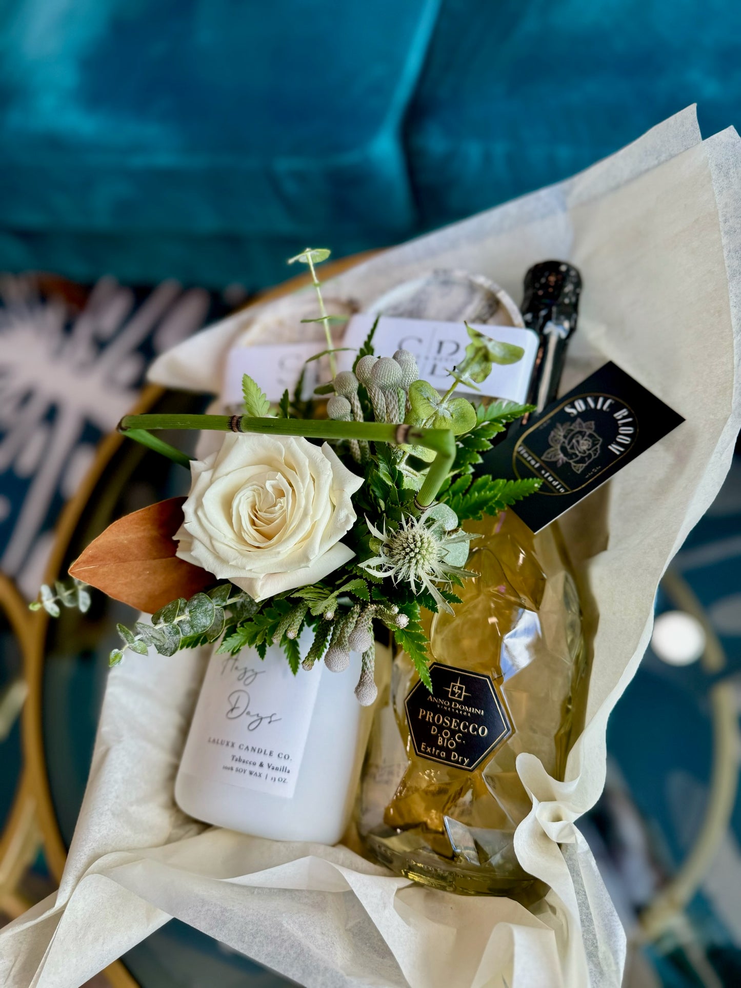 Lethbridge Gift Box Delivery Pick-up champagne coasters candle small arrangment with white rose